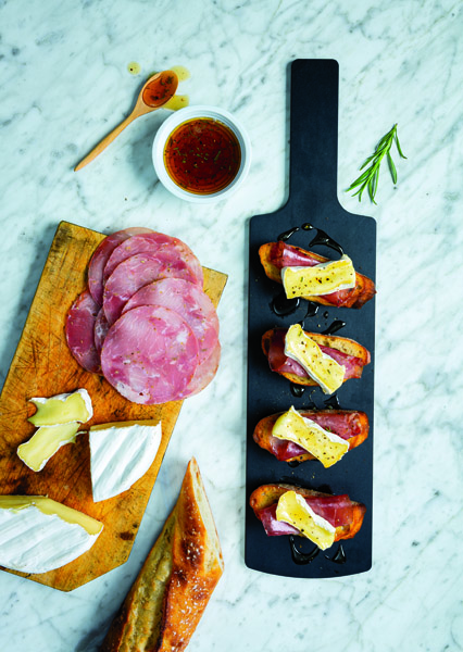 Sourdough Crostini with Brie, Rosemary Sandwich Prosciutto & Rosemary-Infused Honey